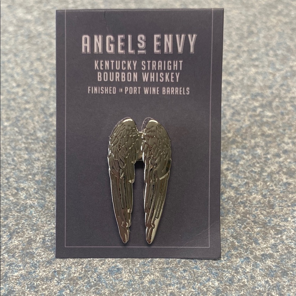 Silver Angel Wing Brooch with Intricate Feather Details